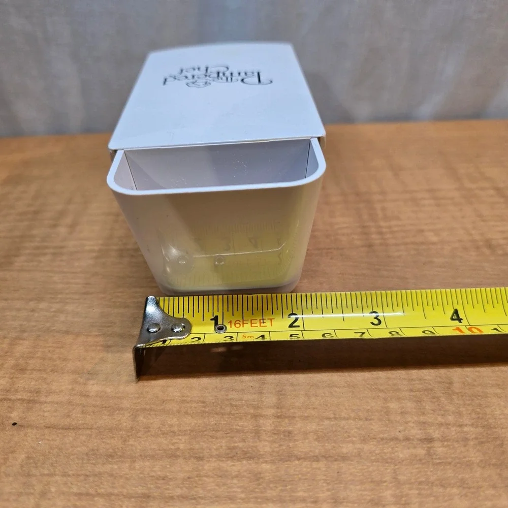 The Pampered Chef Adjustable Measuring Cup Scoop 1/8 - 1/2‎ or 25ml to 125ml